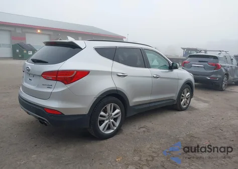 2014 Hyundai Santa Fe Sport 2.0L Turbo z USA, uszkodzony, nr VIN 5XYZWDLA6EG220309